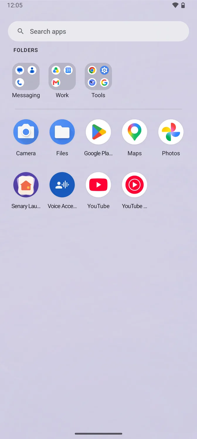 The app drawer in the light theme: a row of three folders called Messaging, Work and Tools, above a short A to Z grid holding the eight apps that are not in one of them.